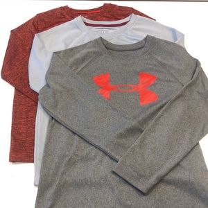 3 kids Under Armour long-sleeve t-shirts